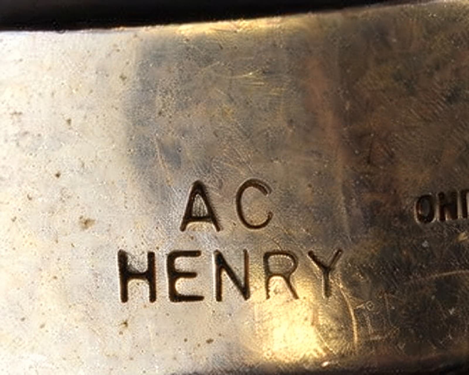 Hallmark of AC – Henry, reading AC HENRY