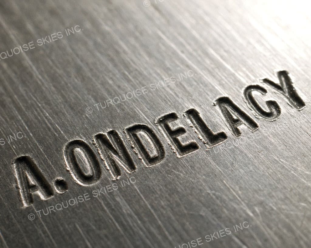 Hallmark of Alberta Ondelacy, reading A.ONDELACY