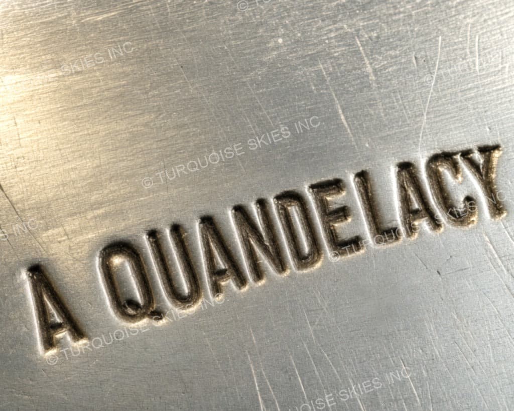 Hallmark of Andres Quandelacy, reading A QUANDELACY