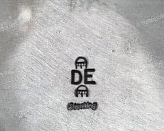 Hallmark of Devin Edison, reading DE