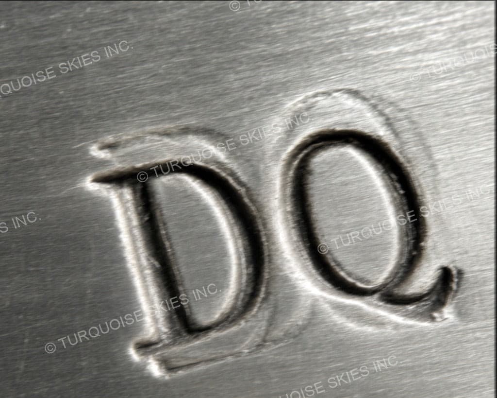 Hallmark of Dickie Quandelacy, reading DQ