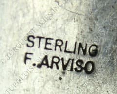 Hallmark of Floyd Arviso, reading F.ARVISO