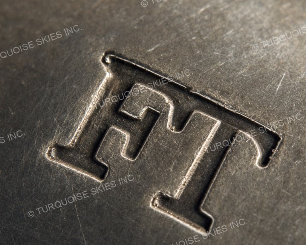 Hallmark of Fritzen Toledo, reading FT