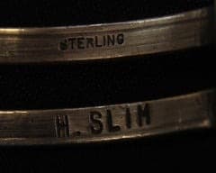 Hallmark of Helen Slim, reading H. SLIM
