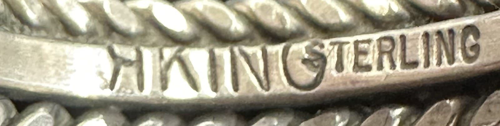 Hallmark of Henry King, reading H