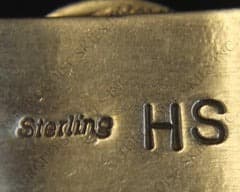 Hallmark of Herman Smith, reading HS