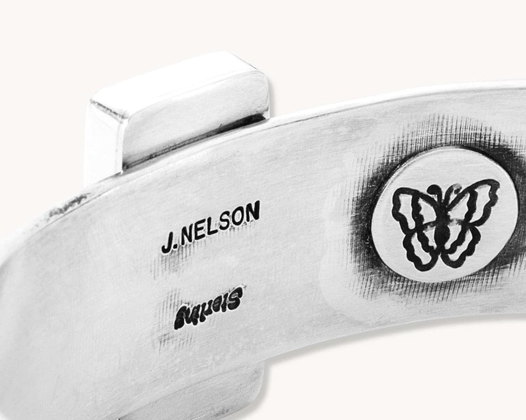Hallmark of Jeanette Nelson, reading J.NELSON