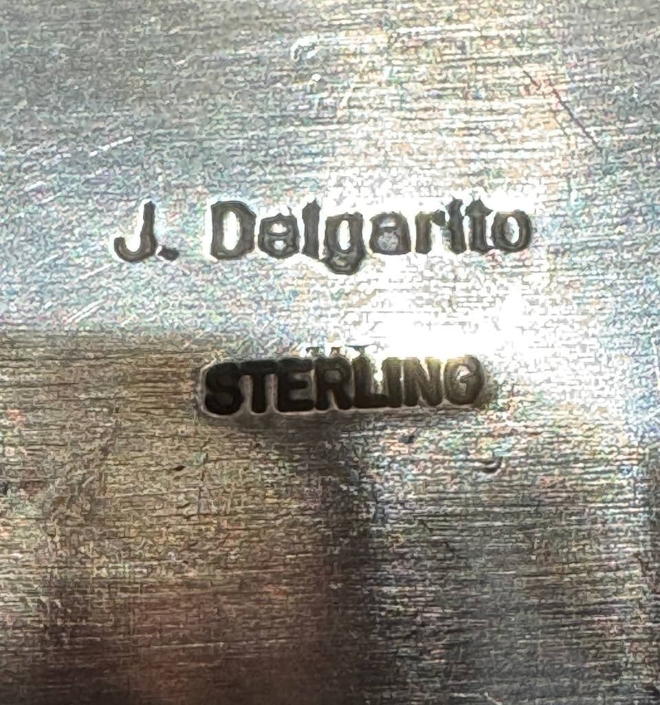 Hallmark of Jeremy Delgarito, reading J. Delgarito