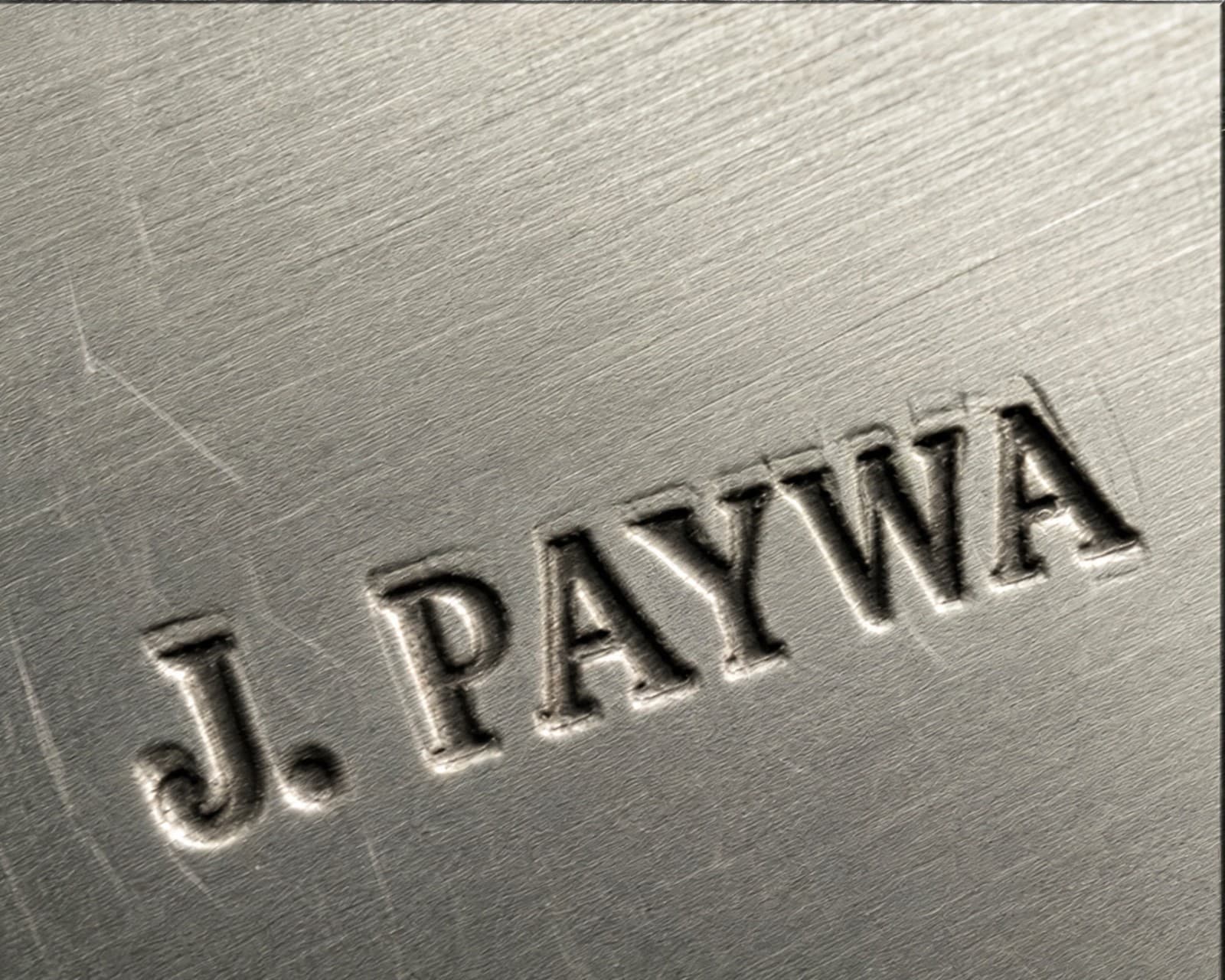 Hallmark of Jim Paywa, reading J. PAYWA