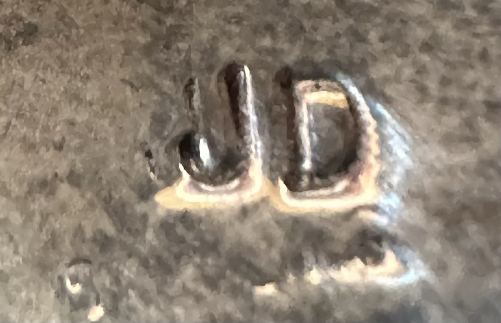 Hallmark of John Duran, reading JD