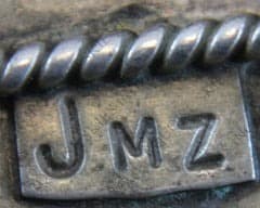 Hallmark of Juan Martinez, reading JMZ