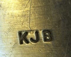 Hallmark of Kee Joe Benally, reading KJB