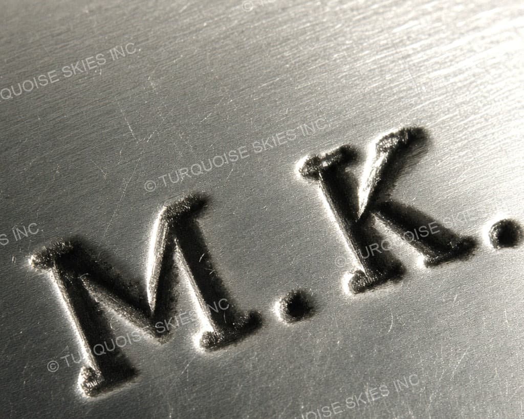 Hallmark of Monica Kanesta, reading M.K.