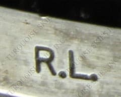 Hallmark of Rob Livingston, reading R.L.