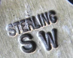 Hallmark of Selina Warner, reading SW