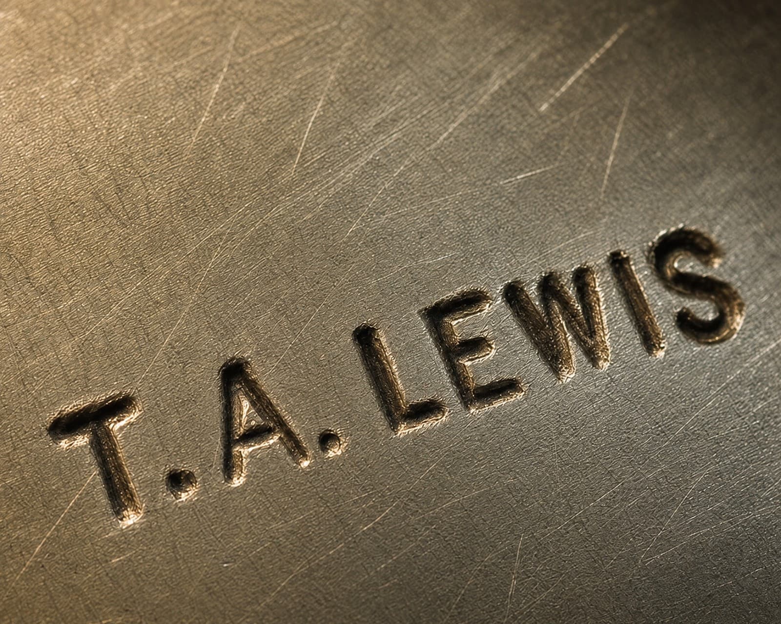 Hallmark of T.A. Lewis, reading T.A. LEWIS