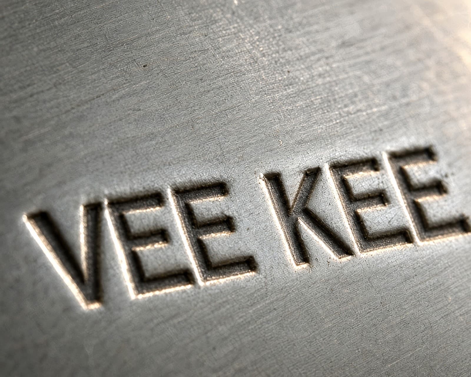 Hallmark of Vee Kee, reading VEE KEE