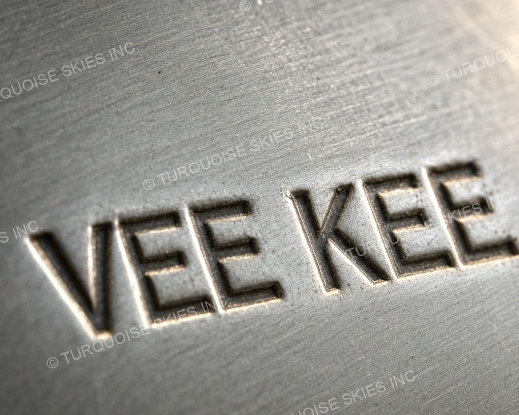 Hallmark of Vee Kee, reading VEE KEE