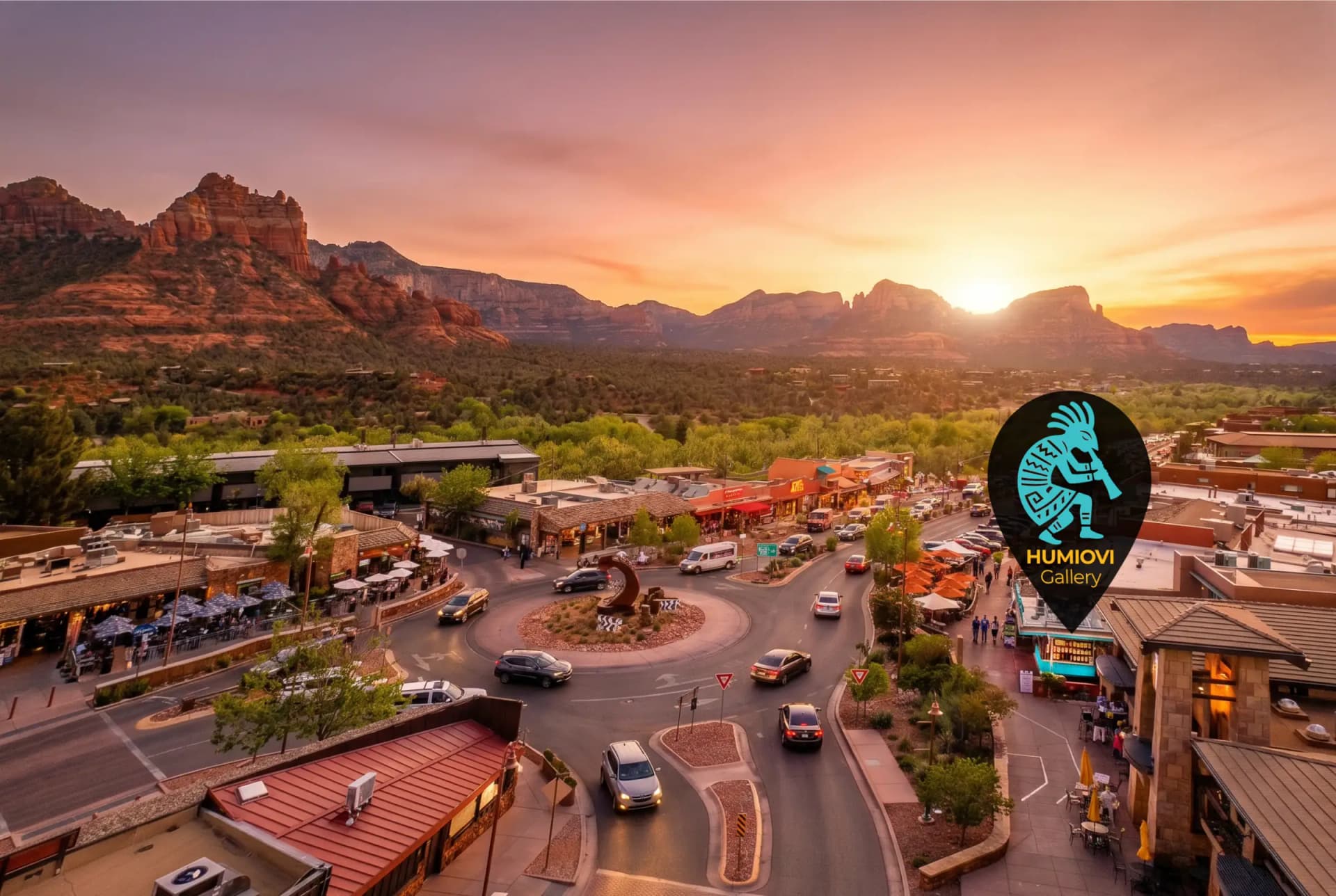 Uptown Sedona at sunset from above: the roundabout at Jordan Road on State Route 89A, the red rocks behind, with the gallery marked