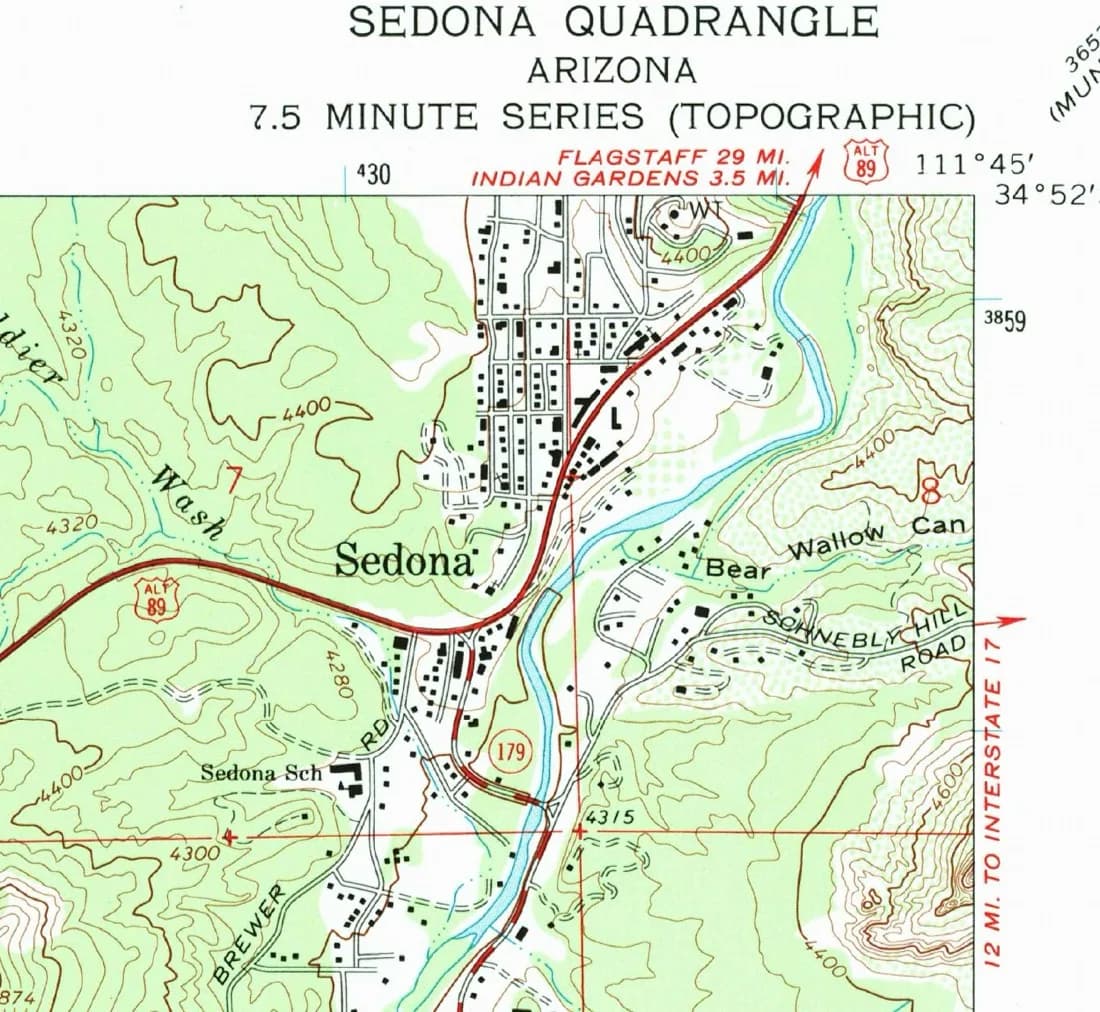 1969 USGS topographic map of Sedona: Alt 89 curving through Uptown's Jordan Road grid, buildings drawn as black squares, Oak Creek in blue