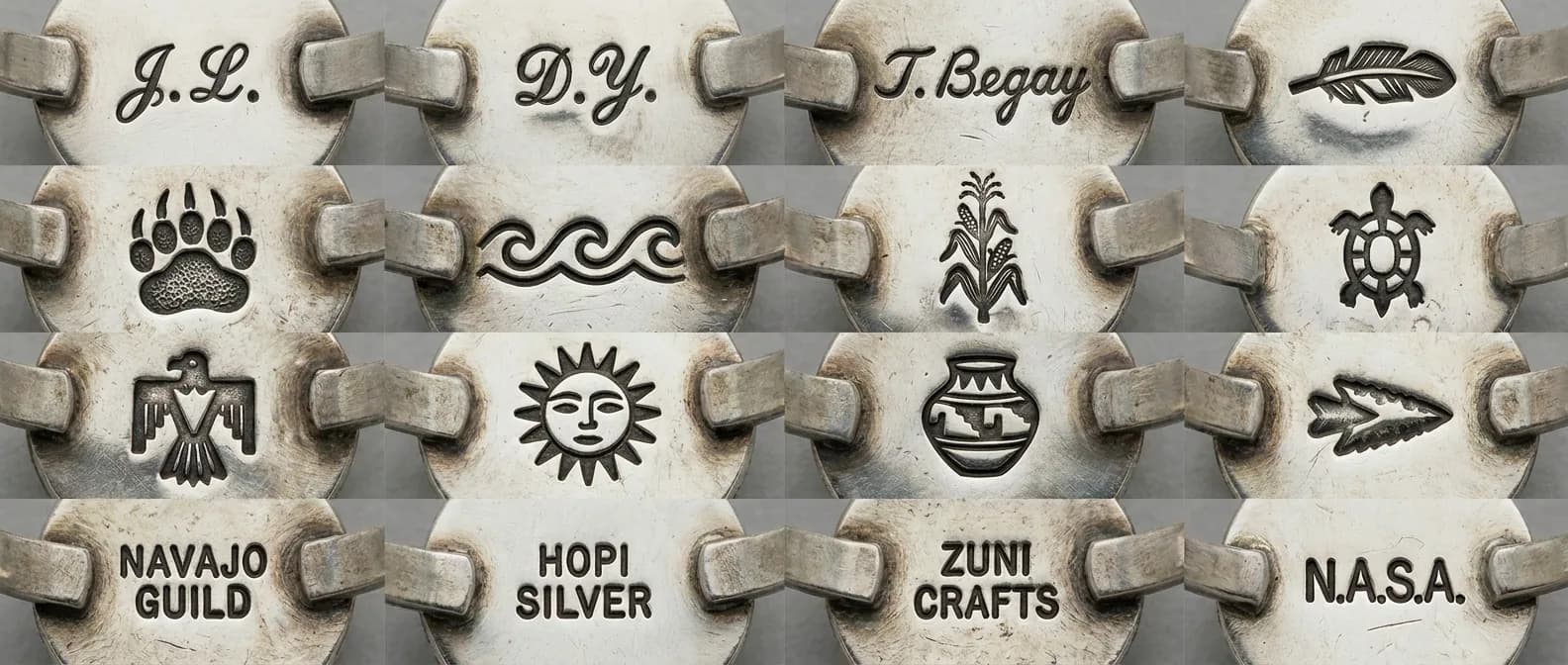 Grid of twelve distinct hallmark styles in extreme macro on silver jewelry backs: initials, clan symbols, and guild stamps