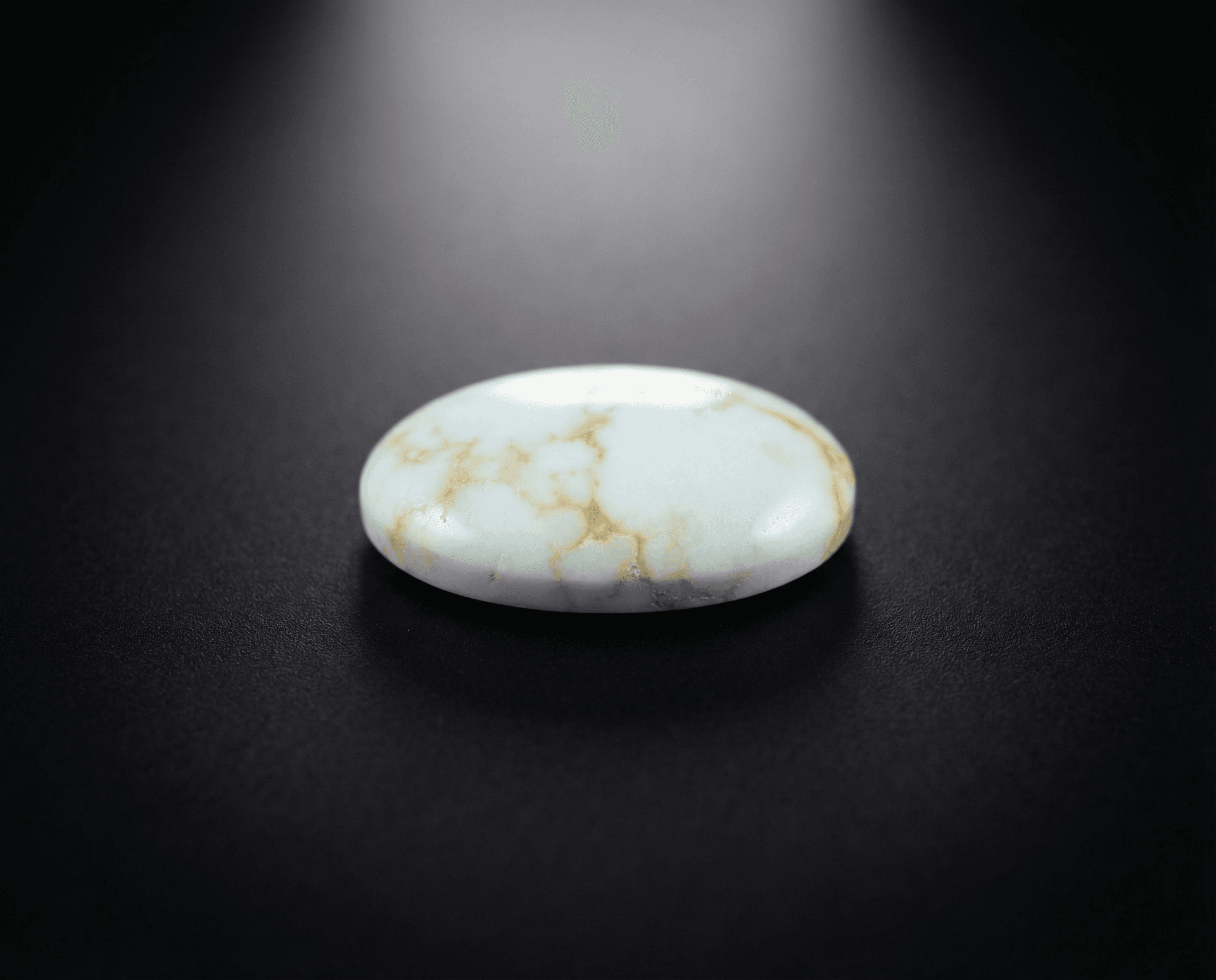 Polished Dry Creek Turquoise cabochon