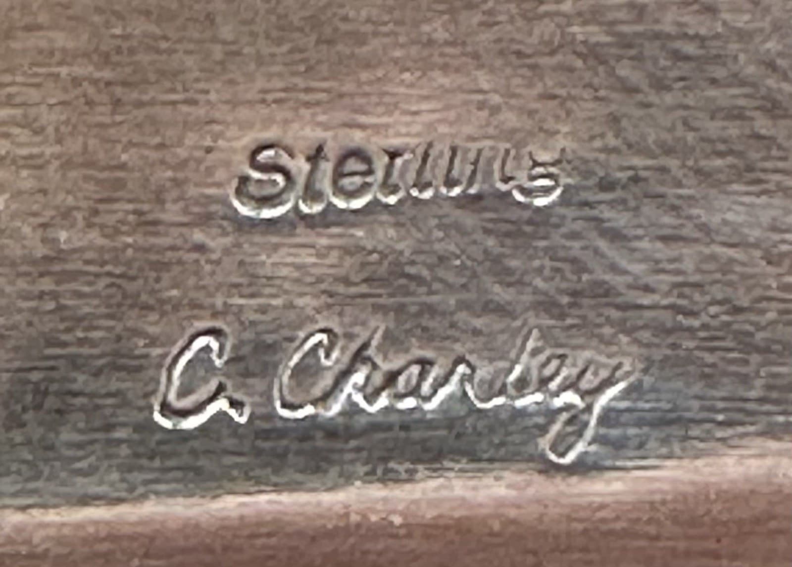 The “C” mark of Cester Charley