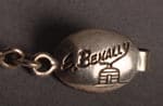 Hallmark of Ernest Benally, reading E Benally