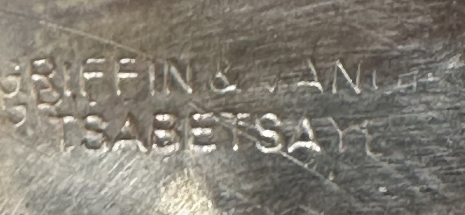The “GRIFFIN & EVANGELINE TSABETSAYE” mark of Griffin & Evangeline Tsabetsaye