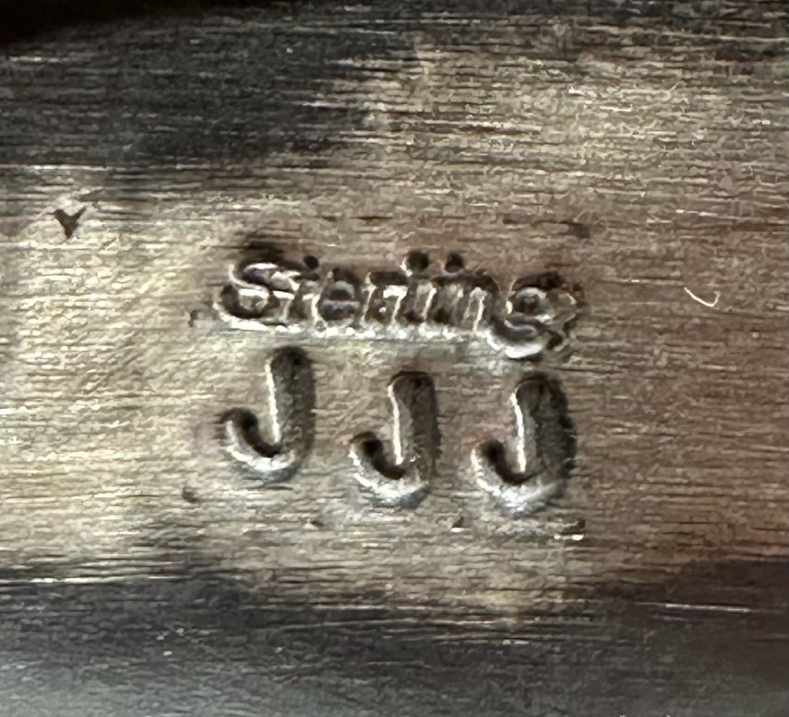 The “JJJ” mark of Jeff James JR