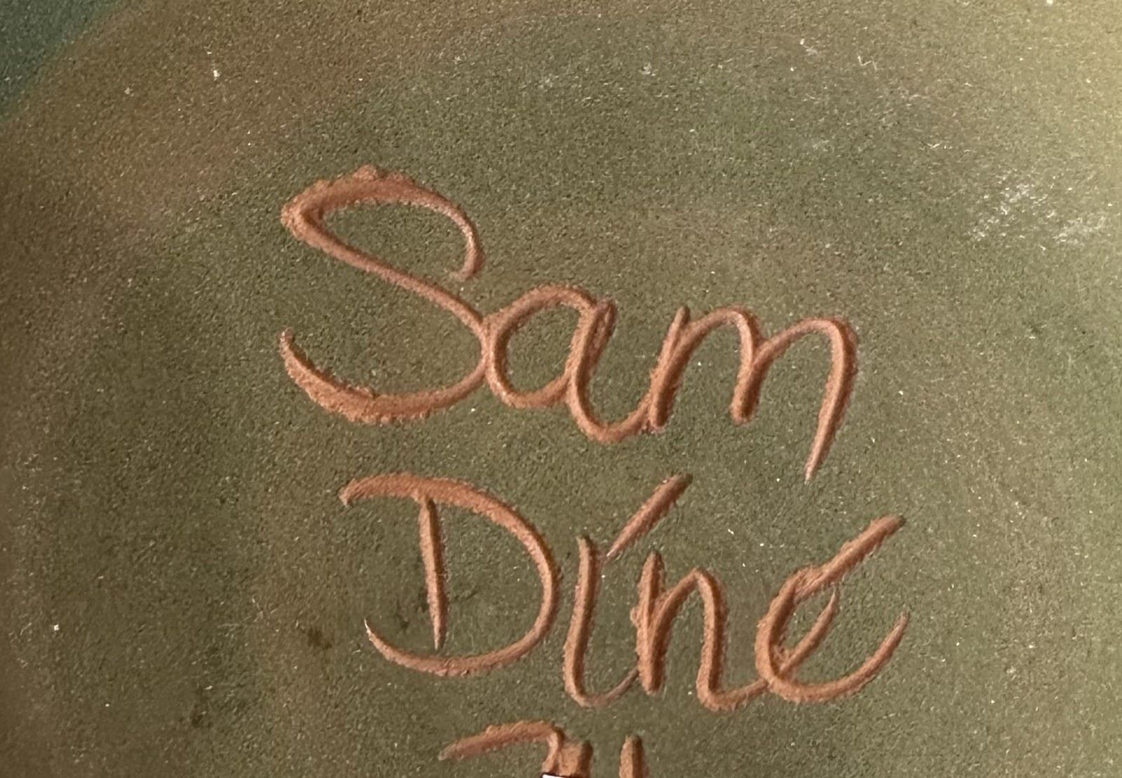 The “Sam Diné” mark of Patricia Sam