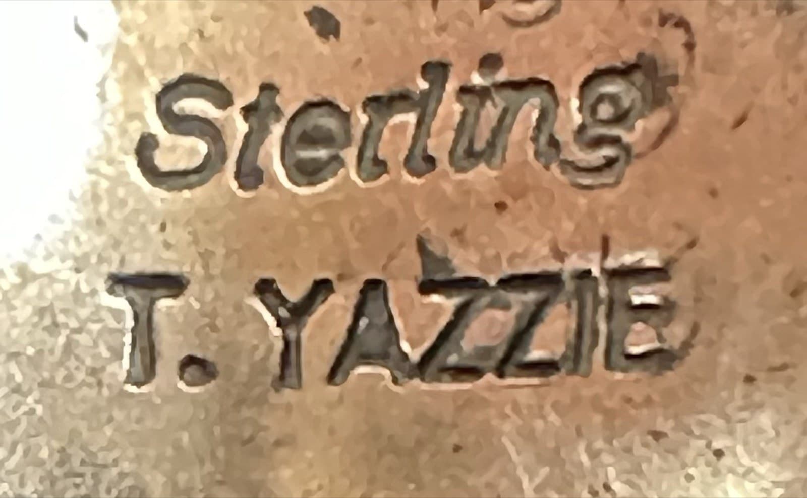 The “T. YAZZIE” mark of Teddy Yazzie