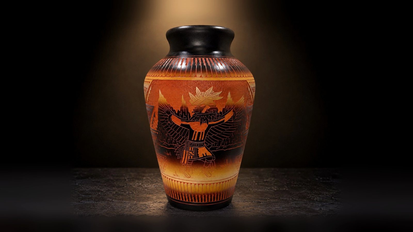 An etched pot by Diane Aragon, Laguna Pueblo, turned through four views, from above and on a shelf